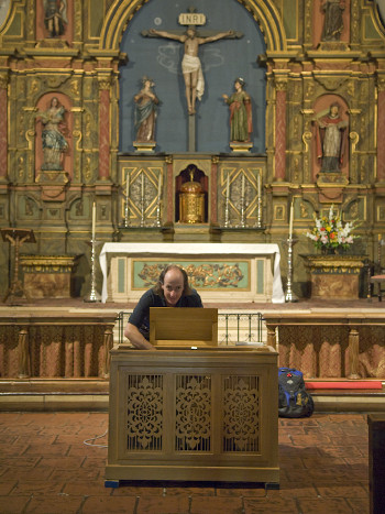 Carey Beebe tuning in the Carmel Mission 73K jpeg